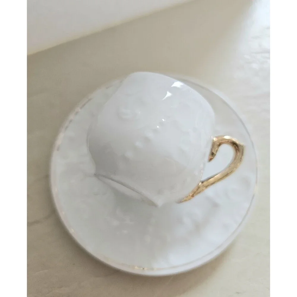 Vintage Miniature White Raised Design Cup And Saucer